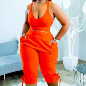 Plus sized orange Capri set.